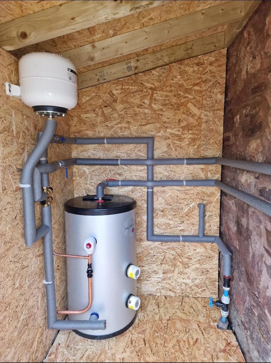 New Viessmann combi boiler installed in a kitchen with Fireflow boiler documents pack ready for handover