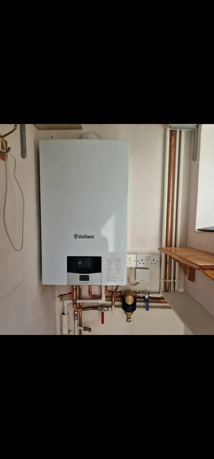 New Vaillant combi boiler installed by Fireflow with system filter and tidy copper pipework